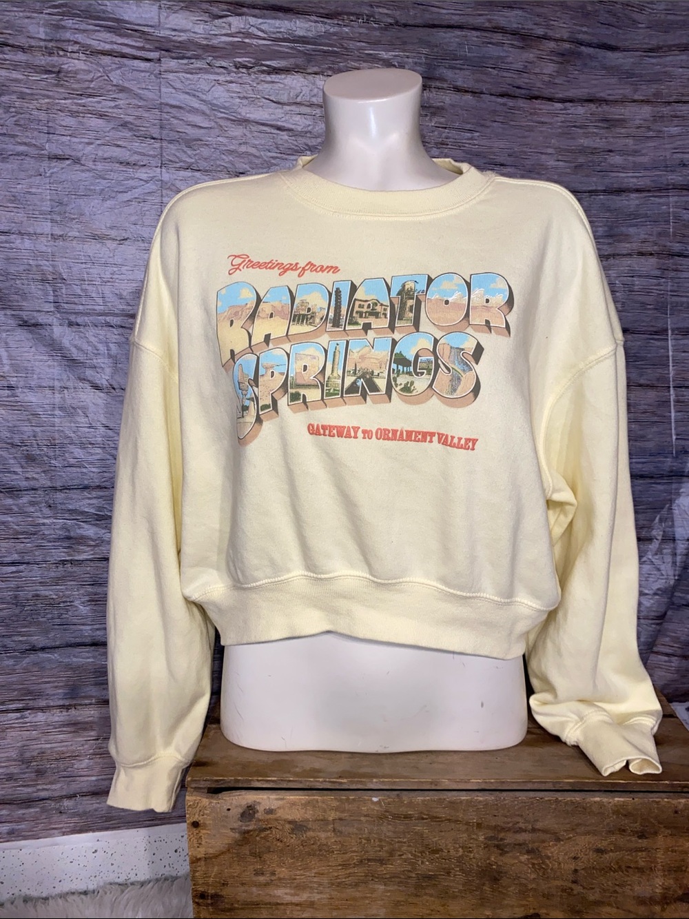 Disney Cars Yellow "Radiator Springs" Graphic Cropped Oversized Sweatshirt - Picture 2 of 5